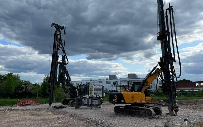 Piling and drilling machinery on gravel surface
